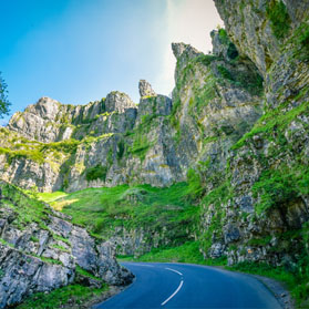A road going up Cheddar Gorge.